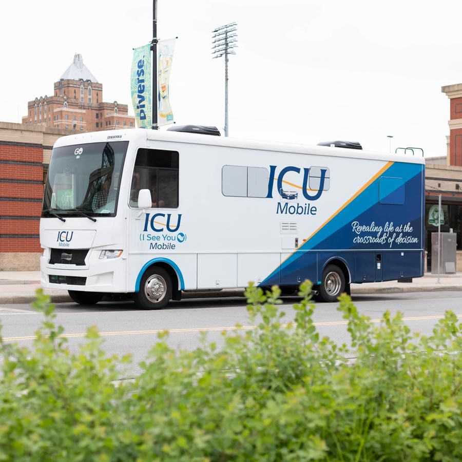 A woman leaving ICU Mobile satifies with the service she received